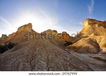 Ancient mountains in desert of Israel on a sunset