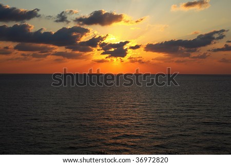 Sparkling sunset in the summer above Mediterranean sea