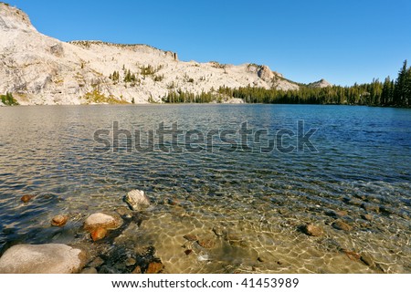 High-mountainous May lake in Yosemite park on road on pass Tioga