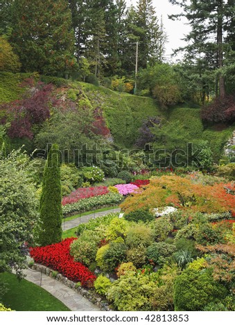 Charming multi-colour flower bed in well-known Butchard-garden in Canada