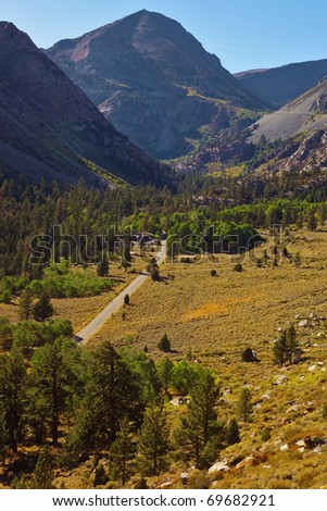 Huge picturesque valley in mountains of national park Yosemite. Clear solar autumn day