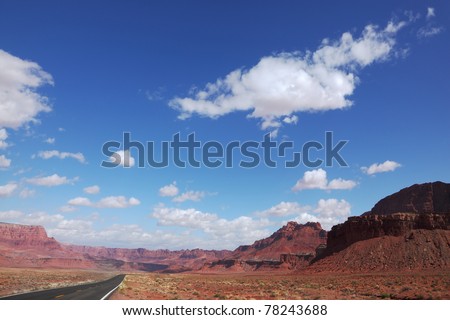 The road in the desert. Red rocks in the desert of California. U.S.