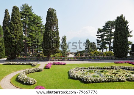 Northern Italy, Lake Maggiore. A masterpiece of landscape art. Bright flower beds in the park on the island of Isola Bella.