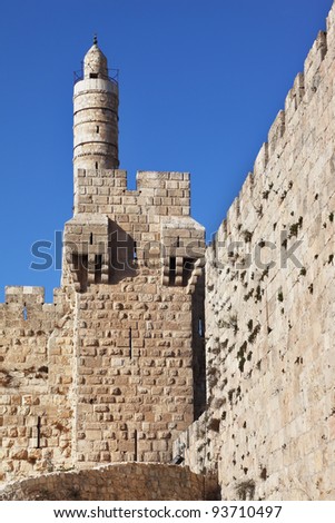 The walls of the eternal Jerusalem. Tower of David on a sunny day. Jerusalem illuminated soft rays sunset
