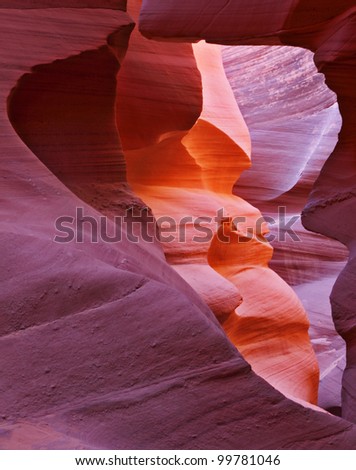 The play of light, colors and shades gives rise to freakish associations. Midday in a red-orange  Antelope Canyon.