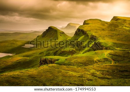 Scenic View Of Quiraing Mountains Sunset With Dramatic Sky In Scottish Highlands, Isle Of Skye, United Kingdom
