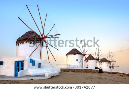 Scenic view of traditional greek windmills on Mykonos island at sunrise, Cyclades, Greece