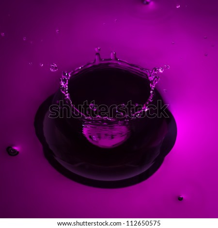Purple water drop splash