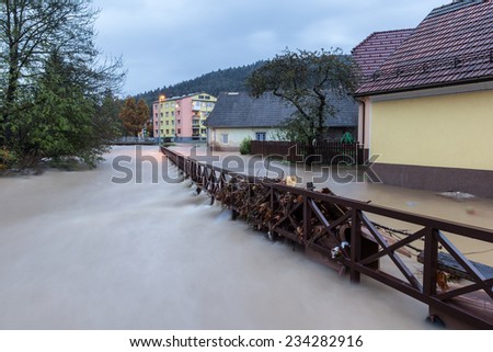 Floods in Cerknica, Slovenia. River flooded the road and the nearby houses