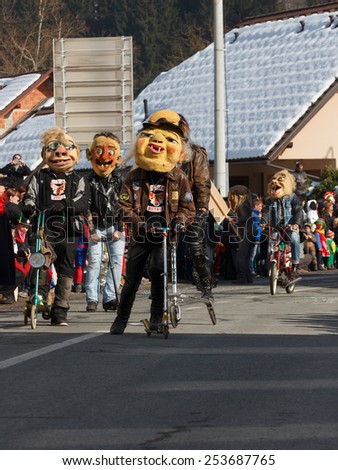 SLOVENIA - FEBRUARY 2015: Famous carnival parade called Pust - 40 ZACOPRANIH with hundreds of traditional and modern masks on February 15, 2015 in Butale, Cerknica, Slovenia