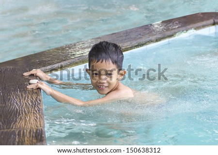 Asian Boy training swim.