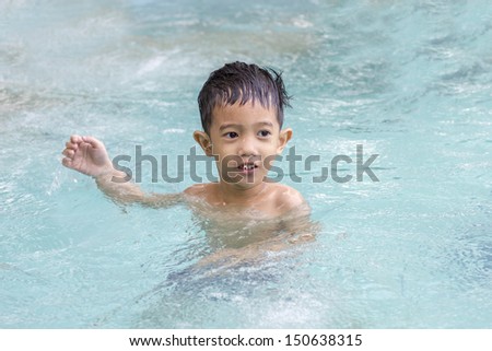 Asian Boy training swim.