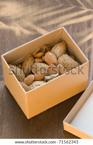 almonds raw, in nature look paper box