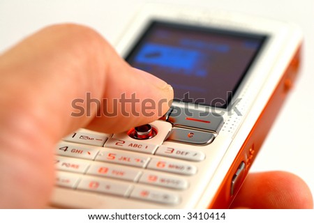 Dialing a modern mobile phone over white