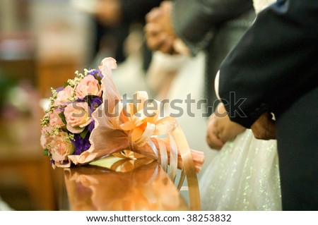 The close up of wedding bouquet at church on wedding day