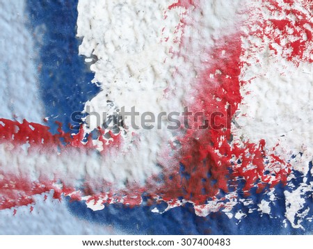 Small part of plastered hoarse old wall painted with white, blue  and red paint - Close up of colourful abstract background