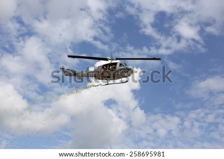CHIANGMAI, THAILAND - JANUARY 10: Bell-212 Helicopter in Thai National Children's Day on January 10, 2015 in Chiang Mai, Thailand.