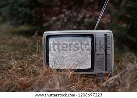White noise on analogue TV set in outdoor environment