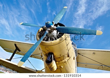 Engine of an old airplane from low angle