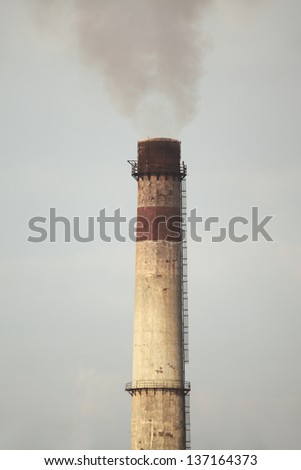 Smoking chimney of an industrial plant