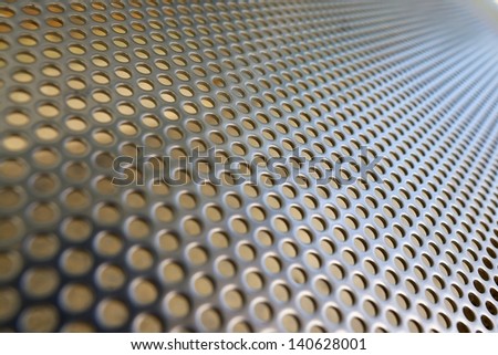 Shiny metal hole mesh pattern