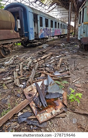 Abandoned train carriage in a decaying depo