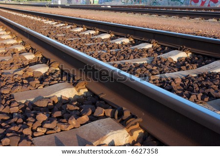 Closeup of straight railway tracks, low angle