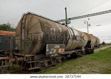 Old, abandoned, rusty oil transporting railway wagons