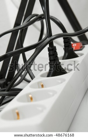 Electric extension cord and other cables connected