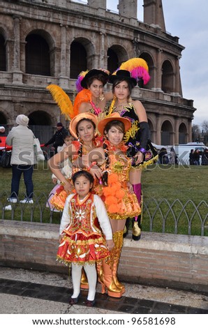 ROME , ITALY - FEBRUARY 19 : Unidentified female dancers posing during the Carnival of Rome on February 19 , 2012 in Rome , Italy