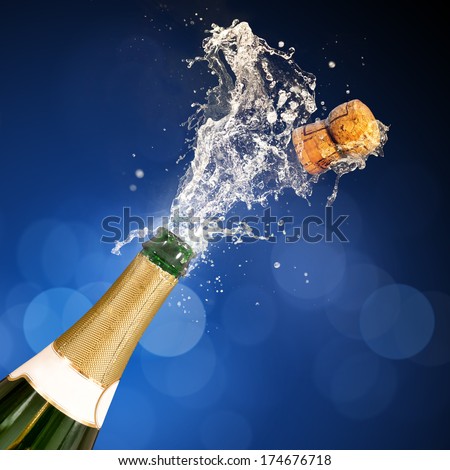 A Champagne Bottle Popping Open. Celebrations.