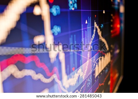 Close up image of stock market data on a computer monitor.