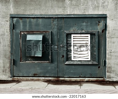 closeup of weathered doors on utility room
