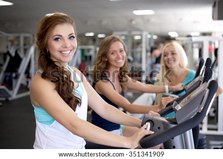 Woman running on a treadmill/Running on a Treadmill