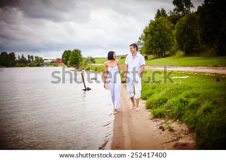 Couple in love near the water. Couple having a great day. Love. Valentines day. Romantic time.