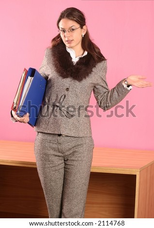 woman at work holding a file with documents-on pink