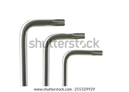Three right angle hexalobular wrench in front of background