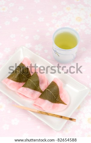 Japanese rice cake covered with sweetened bean jam wrapped in a preserved cherry leaf