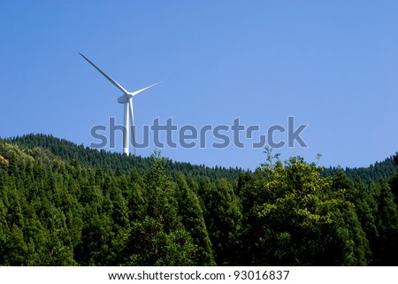 Wind power generator in the coniferous forest