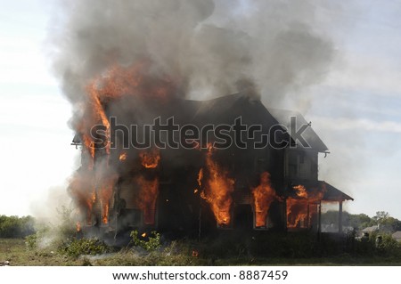 A picture of a house on fire before