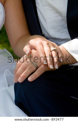 the couple displays the rings
