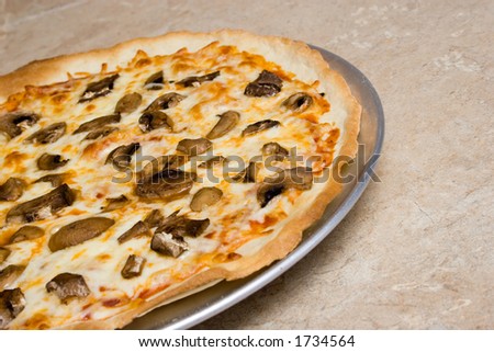 angled shot of home-made mushroom pizza