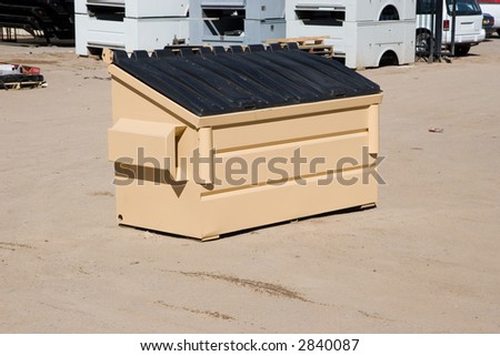 2 cubic yard trash bin in a industrial construction yard