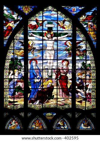 Stained glass church window, jesus on cross