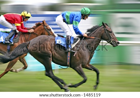 Konji Stock-photo-horses-racing-at-speed-with-blurred-background-1485119