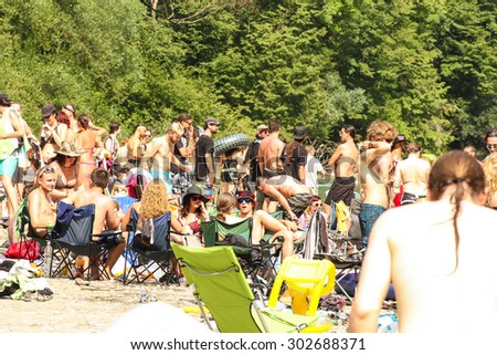 TOLMIN, SLOVENIA - July 21: Heavy Metal Fans have a party at and in the river Soca on the Metaldays Tolmin Festival on July 21, 2015 in Tolmin, Slovenia.