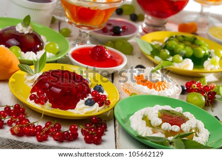 Close-up of various colored jelly with fruits