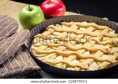 Closeup freshly baked apple pie with fruits