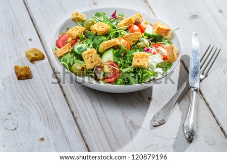[Obrazek: stock-photo-salad-with-arugula-and-tomat...879196.jpg]