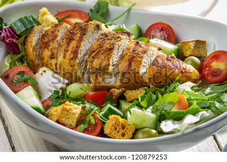 Close-up on a salad with chicken